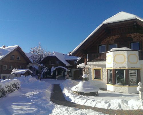 holiday home exterior view and courtyard, Ramsau in winter